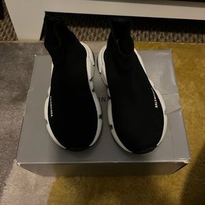 Balenciaga socks gently worn can be unisex it fits a size 8c in us kids size